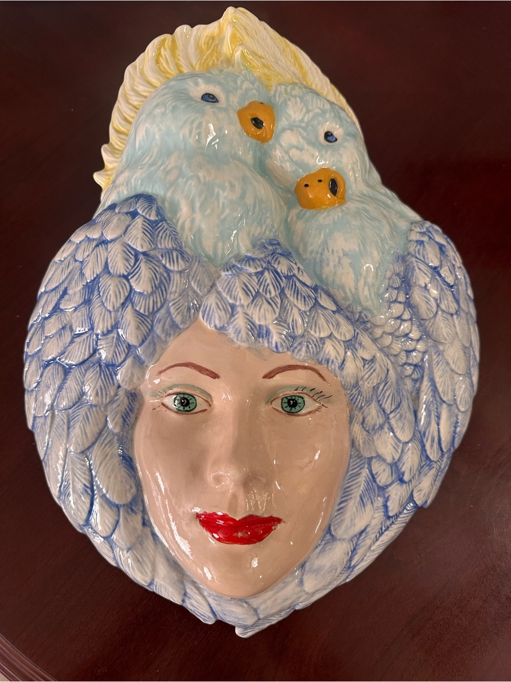Hand-Painted Ceramic Wall Mask with Blue Feathers and Yellow Birds